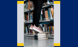 Patron standing on stack of books in order to reach higher shelf